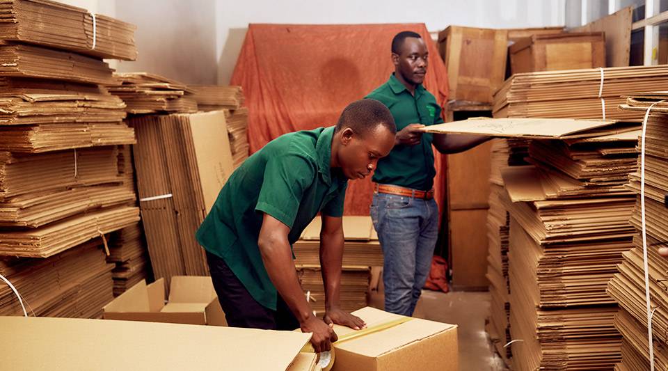 Worldwide Movers Africa team getting packaging ready