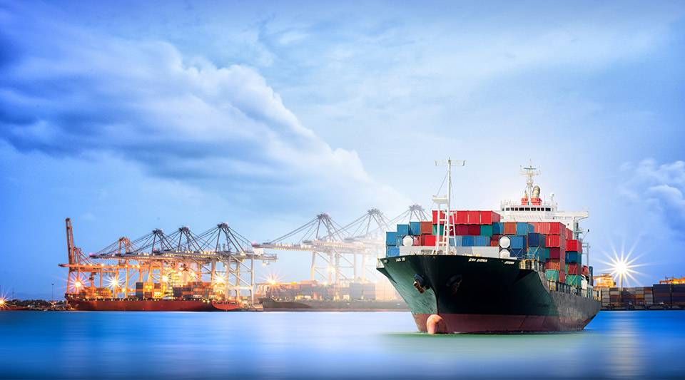 A ship setting sail with cargo